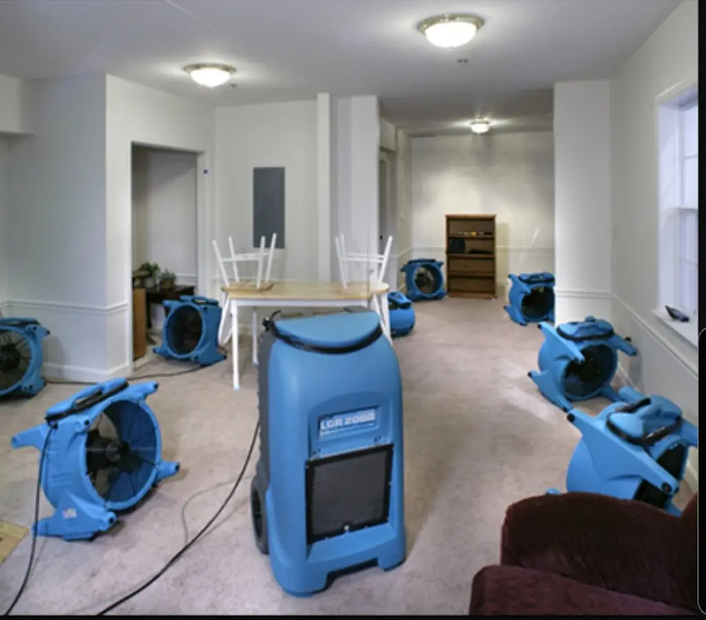 Air movers and dehumidifier setup for Water Damage Restoration in Montclair